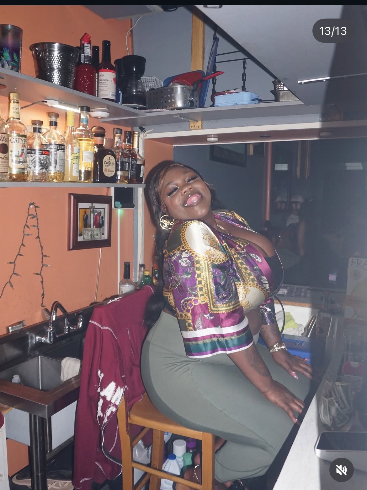 A guest posing at The Alley bar